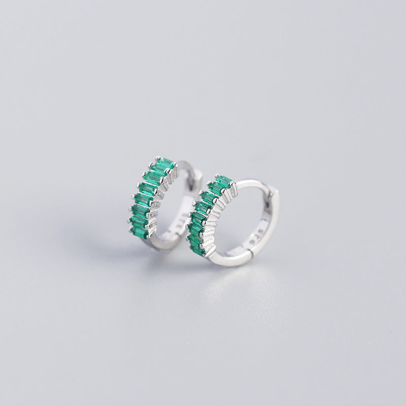 Elegant dainty stud earrings USA featuring shimmering green gemstones in a hoop design