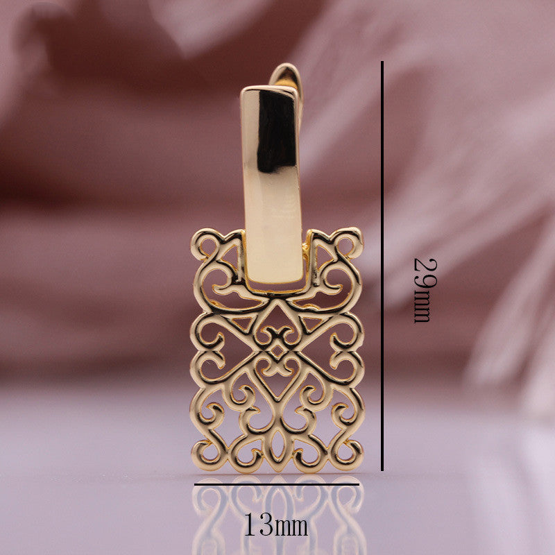 Elegant hollow square earrings USA in gold with intricate design and measuring 29mm by 13mm