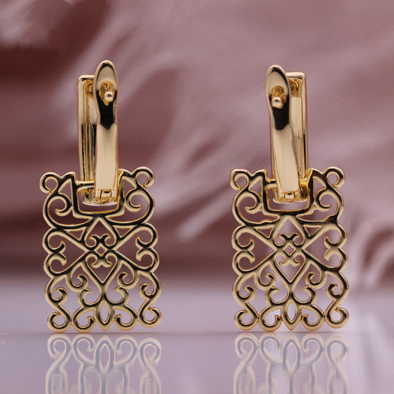 Stylish hollow square earrings USA in gold, featuring intricate cutout designs for elegant styling