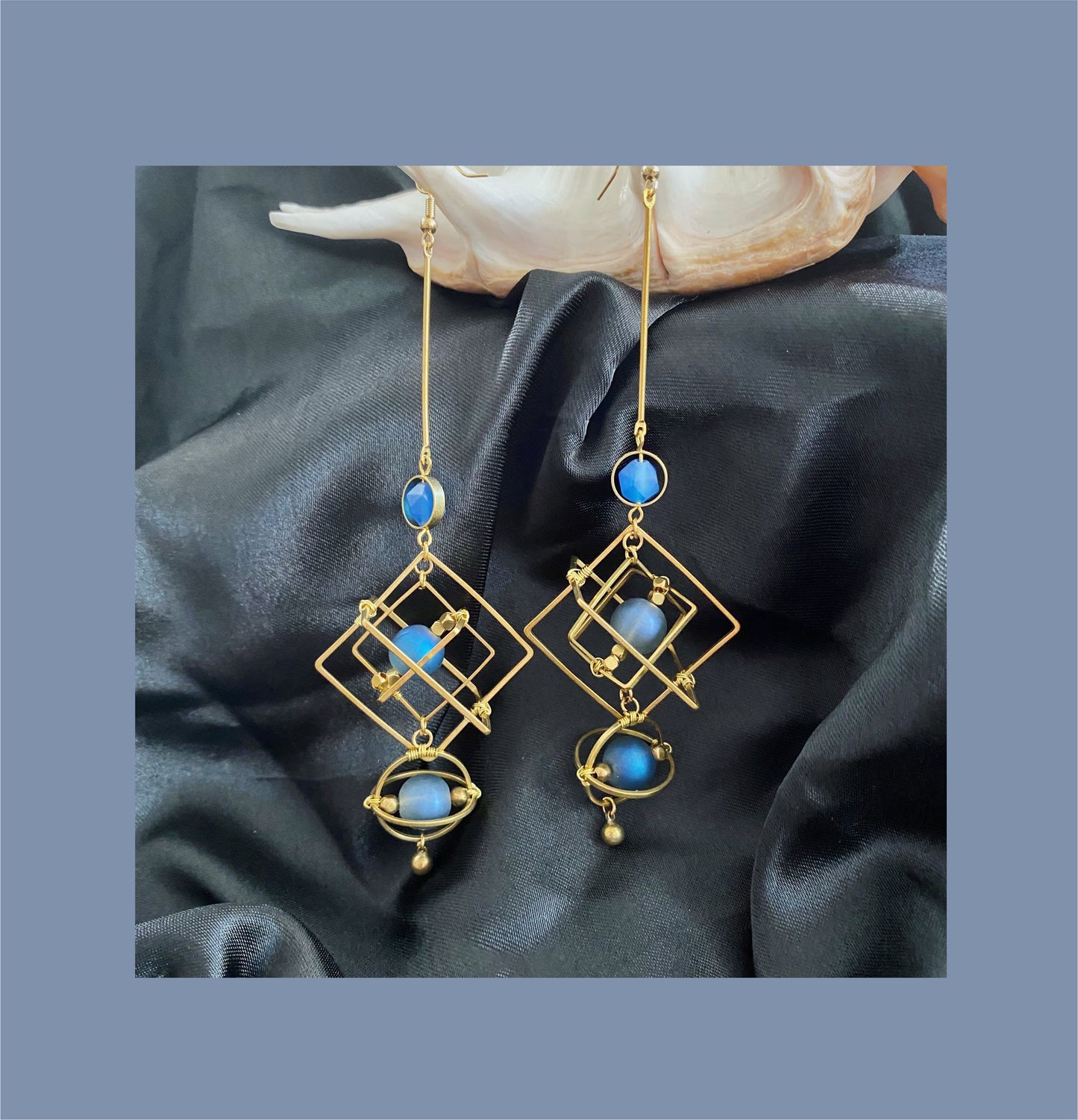 Gold Statement Earrings with Blue Crystal Earrings for a Stylish Look