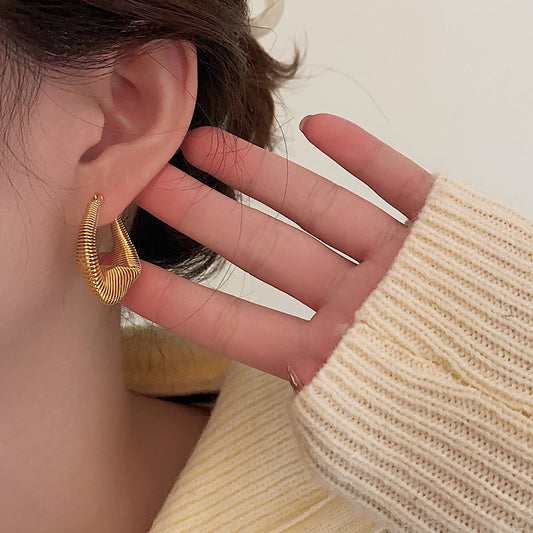 Stylish and elegant dainty hoop earrings USA with a unique twisted design for everyday wear