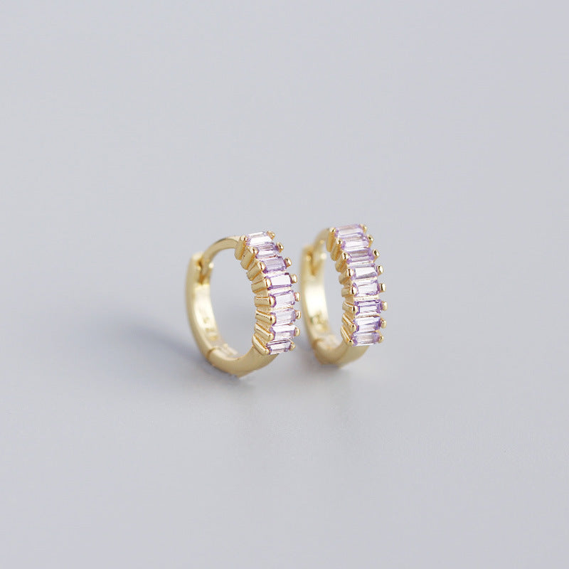 Elegant gold hoops featuring sparkling stones, perfect dainty stud earrings USA for stylish outfits