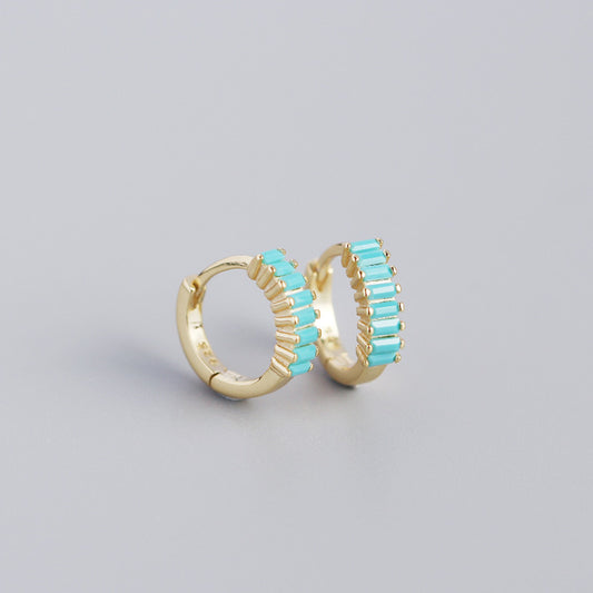 Dainty Stud Earrings USA featuring gold hoops with turquoise accents for a stylish look