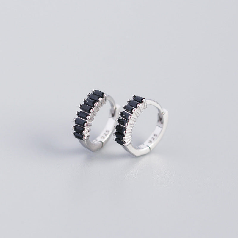 Elegant Dainty Stud Earrings USA featuring a sleek black design with sparkling accents
