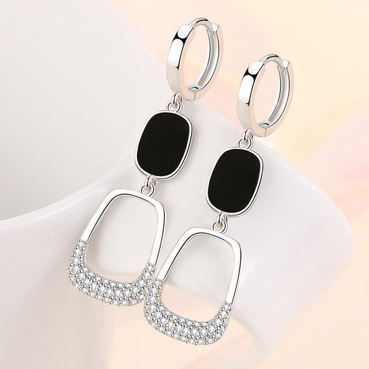 Elegant hollow out diamond earrings with black accents and sparkling details for a chic look