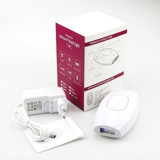 Smooth Beam portable laser hair removal device with power adapter and user manual next to product packaging