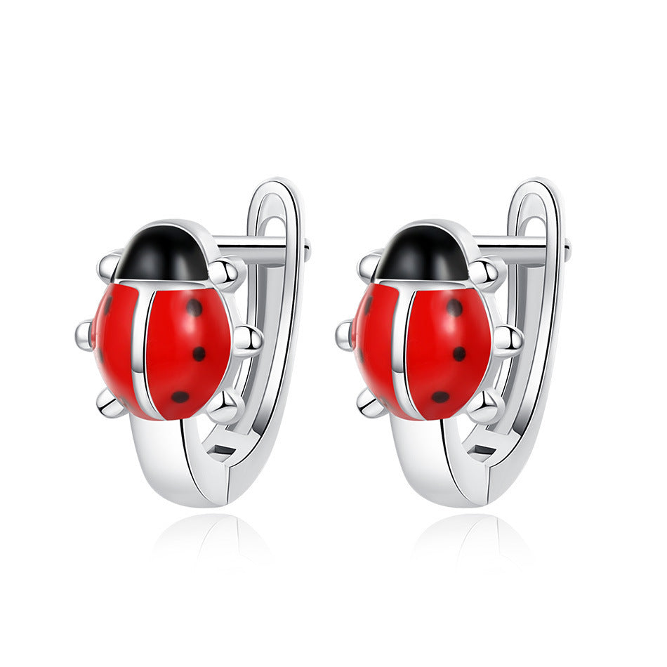 Sterling silver butterfly earrings featuring a whimsical ladybug design for stylish wear