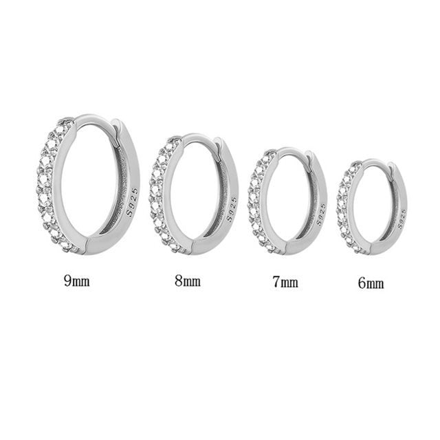 Unisex silver hoops USA in various sizes, featuring sparkling accents for versatile style